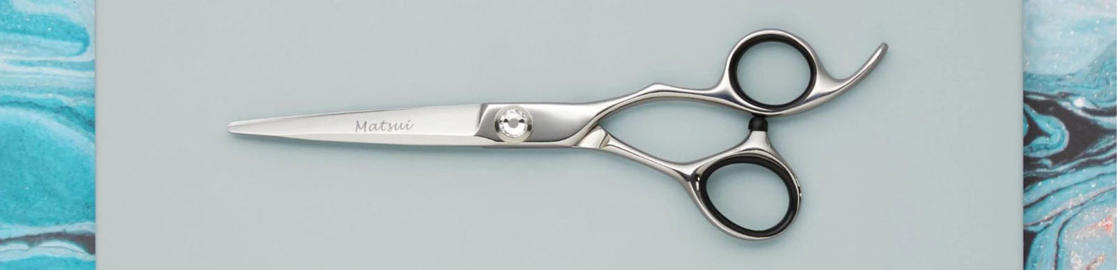 Silver barber scissors.