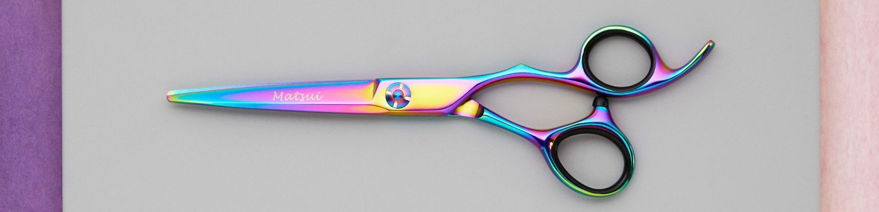 Colourful hairdressing scissors.