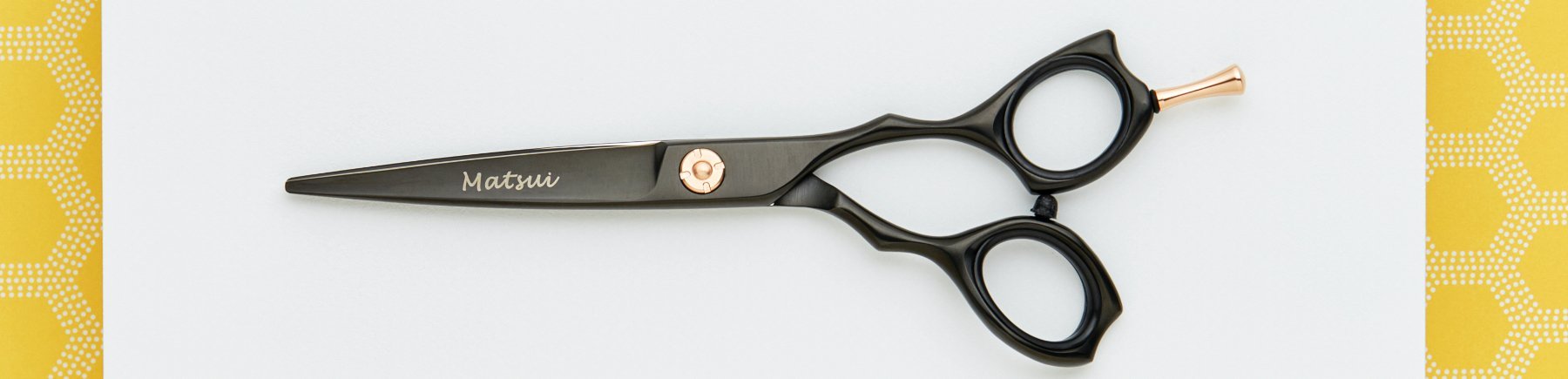 Matt black barber scissors.