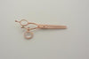 Matsui left hand Roségold hairdressing and modelling scissors with movable thumb as a set